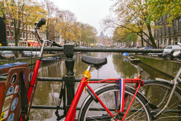 istock Bikes on the bridge in Amsterdam Netherlands 1264197052