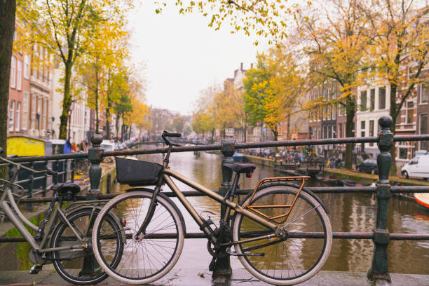 istock Bikes on the bridge in Amsterdam Netherlands 1264197081