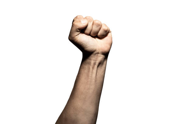 istock Hand expressing power signal in white backround. dramatic lights 1264201340