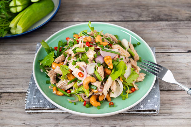 istock Steamed rip chicken spicy salad with shallot, celery, chili and Scallion. 1264206164