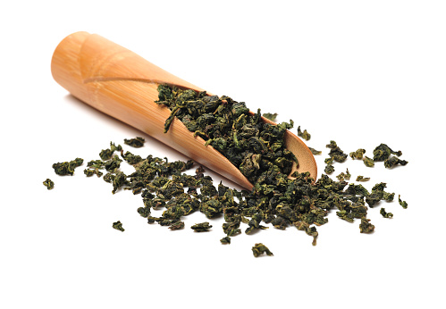 hojas de té verde seco photo