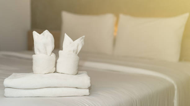 istock White bath towel on bed decoration interior in hotel. 1264213983