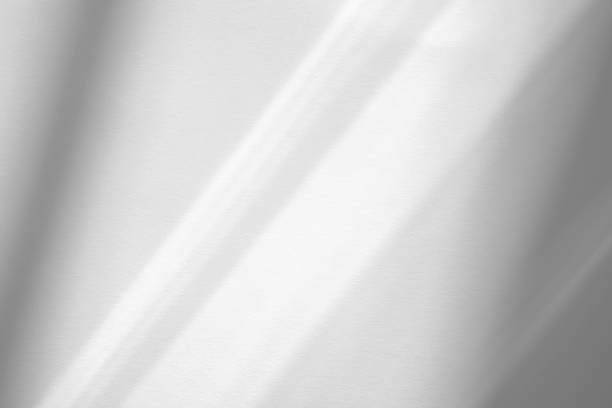 istock diagonal shadow and rays of light on a white background 1264215497