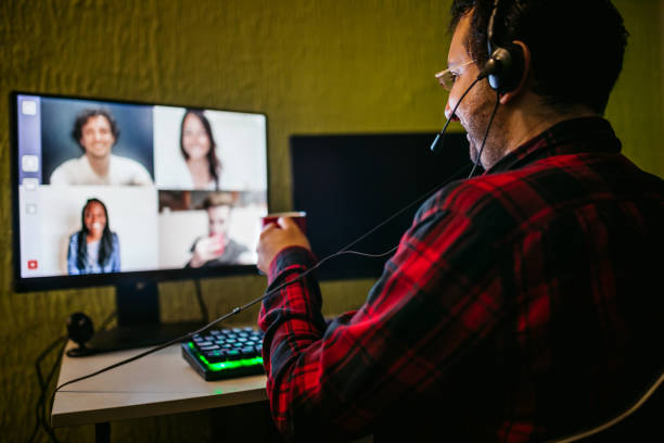 istock Man having a video call with friends 1264219316