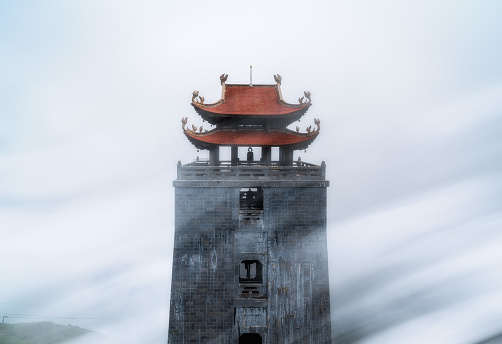 Kim Son Bao Thang Pagoda on Fansipan moutain peak, Sapa, Lao Cai, North Vietnam in cloud flying