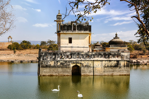 Queen Padmini palace ruins isolated in the middle of a lake inside Chittorgarh Fort Rajasthan, India