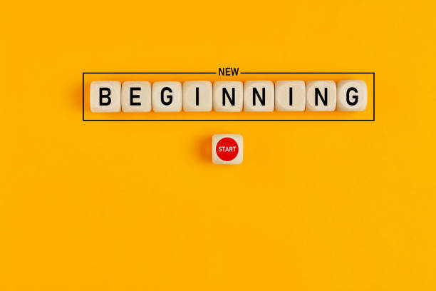 istock Starting a new beginning concept. The word new beginning on wooden cubes with a start button. 1264225428