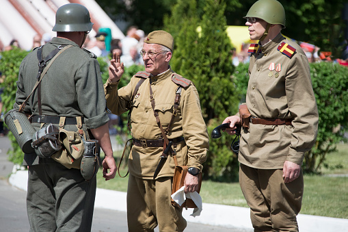 Belarus, Gomel. May 9, 2018. Victory Day. Reconstruction take Reichstag.Historical reconstruction in 1945, capture of the Reichstag.Russian soldiers and German soldiers of the Second World War negotiate surrender