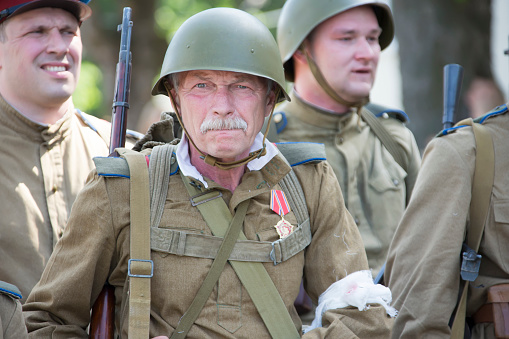 Belarus, Gomel. May 9, 2018. Victory Day. Historical reconstruction in 1945, capture of the Reichstag.Soldier of the Second World War. Warrior of the Red Army. Veteran of the Great Patriotic War in the form of