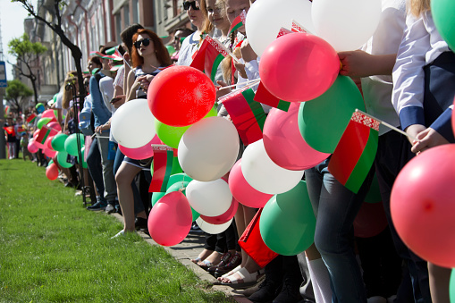 Belarus, the city of Gomel, May 9, 2018. Holiday Victory Day. Central Park.People on a holiday with balloons and Belarusian flags