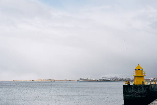 A large yellow lighthouse in Iceland, Reykjavik. High quality photo