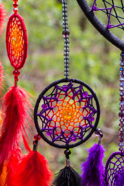 istock Handmade dream catcher with feathers threads and beads rope hanging 1264242753