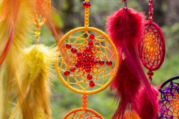 istock Handmade dream catcher with feathers threads and beads rope hanging 1264242754