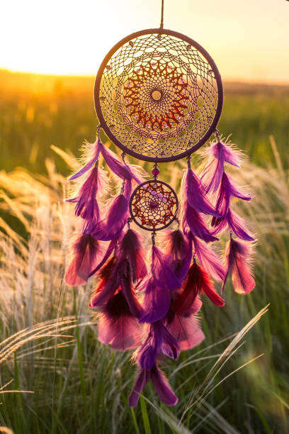 istock Handmade dream catcher with feathers threads and beads rope hanging 1264243350