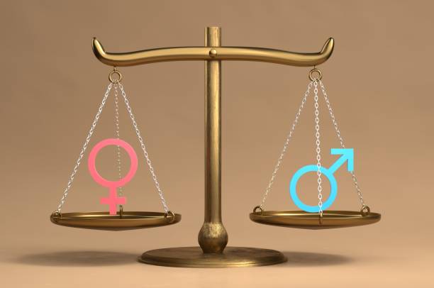 igualdade de gênero - gender symbol scales of justice weight scale imbalance - fotografias e filmes do acervo