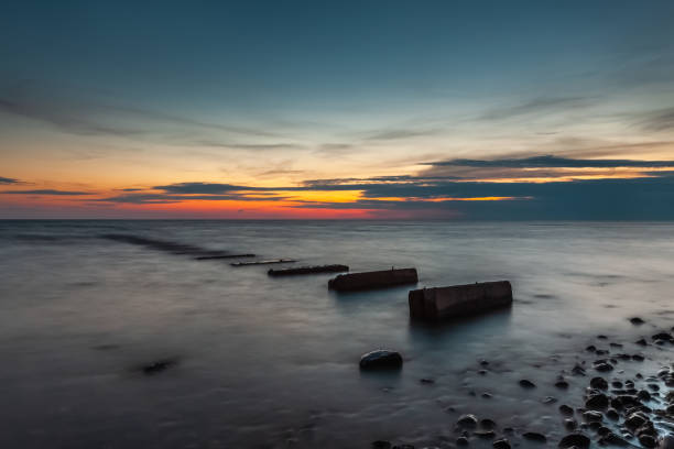 istock Old concrete pier at sea 1264246885