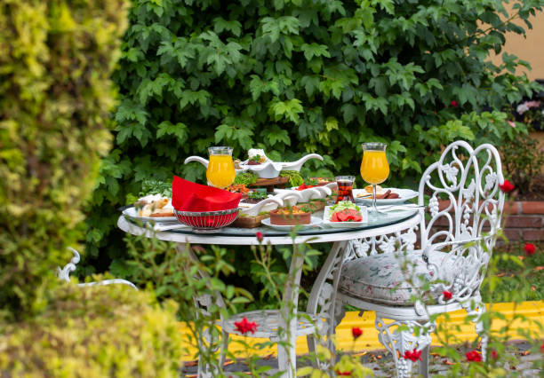 istock flowering garden and breakfast table 1264246901