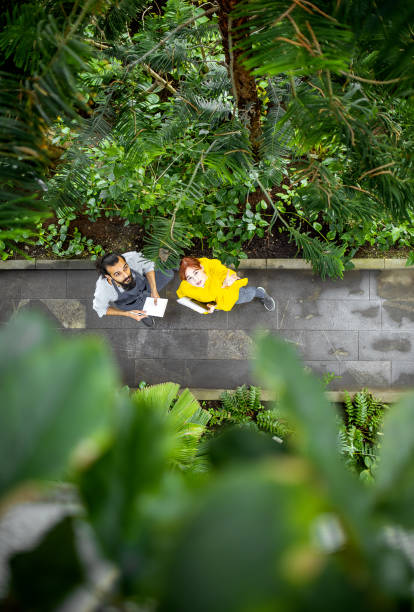 istock Two People working at the botanical garden 1264248390