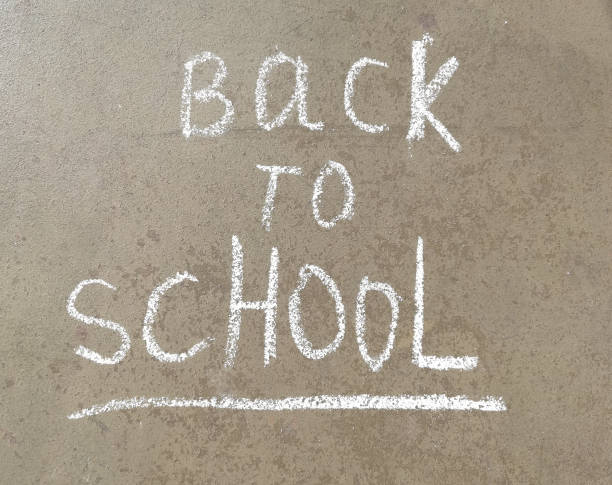 istock chalk lettering on the blackboard back to school. training, the beginning school year 1264248517