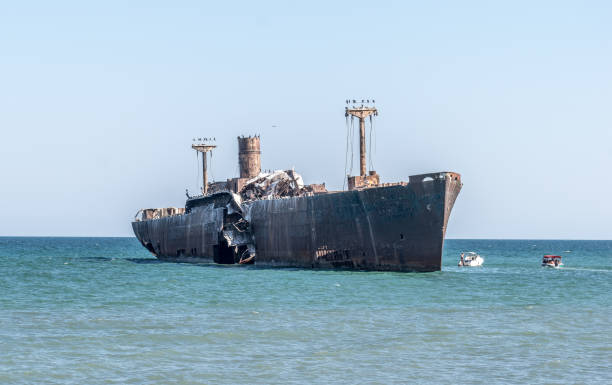 istock A shipwreck. An old wreck abandoned at sea. 1264256106