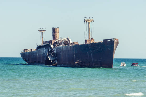 istock A shipwreck. An old wreck abandoned at sea. 1264256554