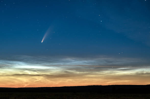 istock Noctilucent Clouds and Comet C/2020 F3 Neowise 1264256582