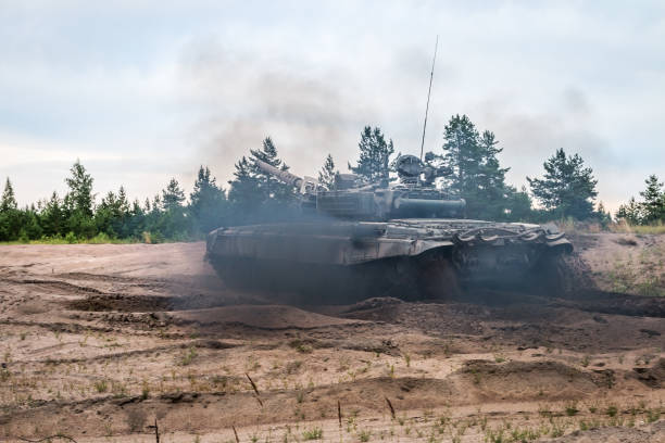 istock battle tank rides on a country road 1264260010