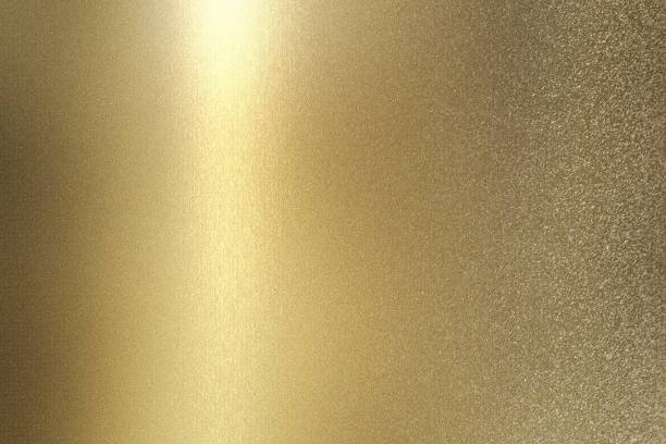 istock Glowing gold foil glitter metallic wall with copy space, abstract texture background 1264267178