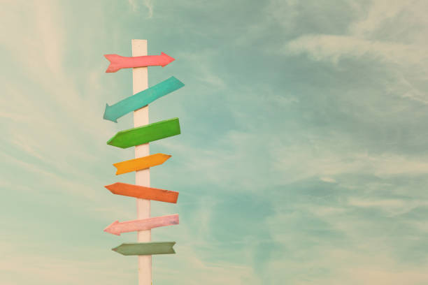 istock Colorful wooden direction arrow signs 1264268898