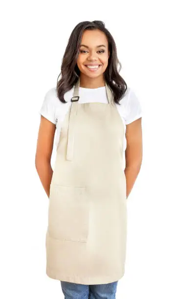 Photo of Smiling young african woman in apron