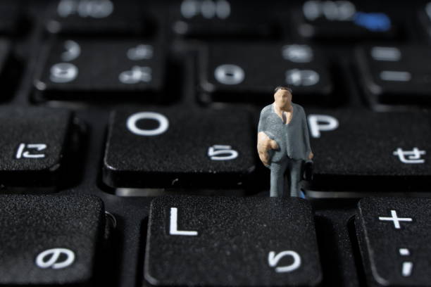 istock a businessman on a keyboard 1264279066