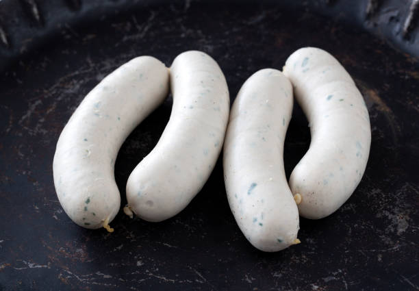 two pairs of white sausages two pairs of white sausages on black background weisswurst photos stock pictures, royalty-free photos & images