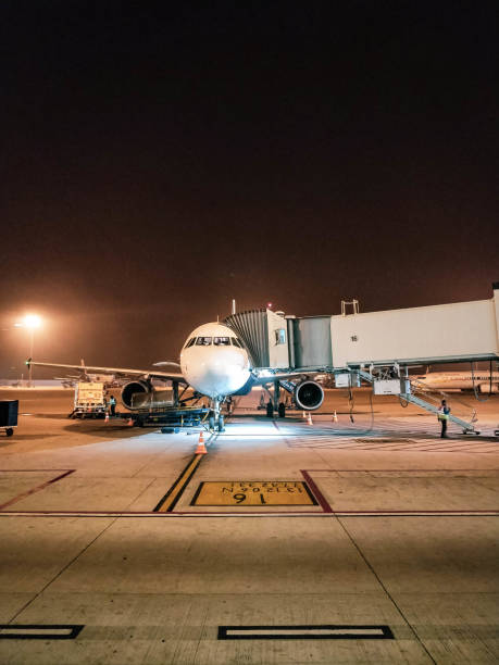 Airplane ready to take-off An airliner getting prepared for departure at an airport in India. india airport stock pictures, royalty-free photos & images