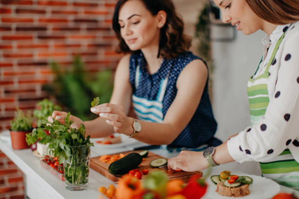 istock Best friends prepare a healthy meal 1264280276