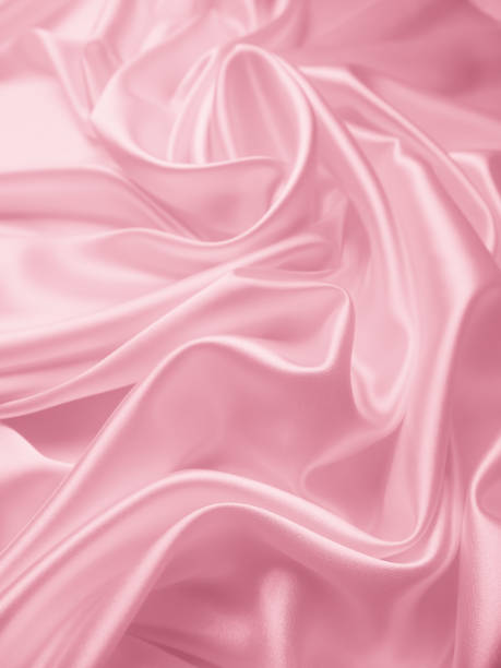 istock Beautiful elegant wavy light pink satin silk 1264280358