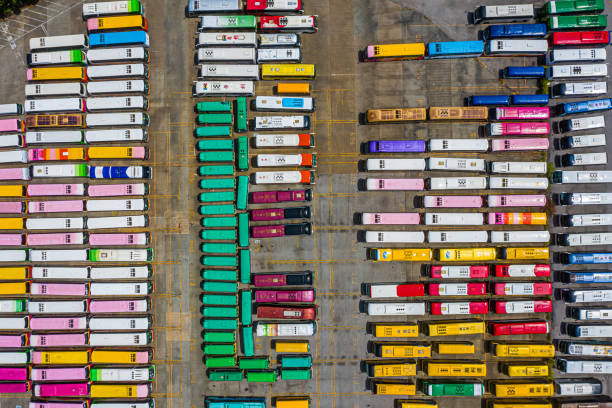 istock Large Group of Tourist bus parking in Container Terminal 1264288509