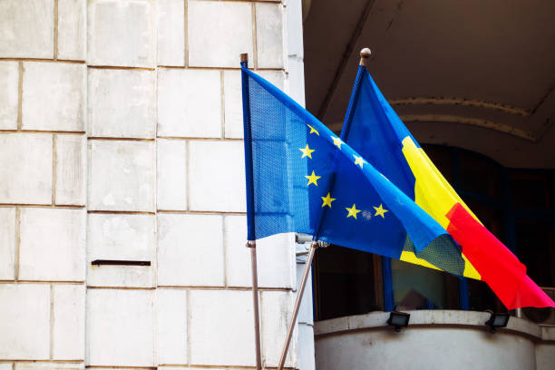 istock BUCHAREST, ROMANIA - August 28, 2017: Romanian and EU flag in Bucharest 1264288862