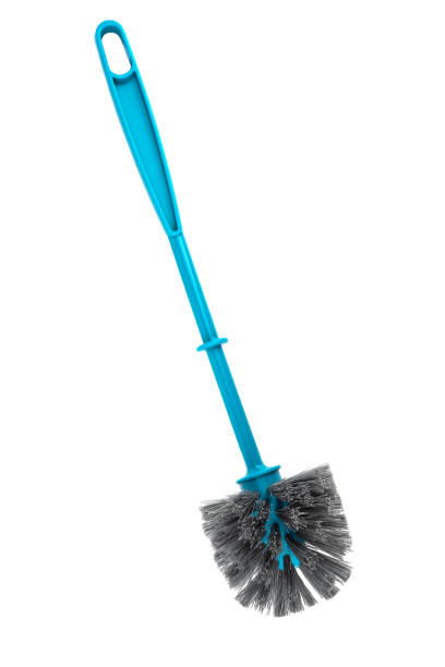 Top view. Toilet brush plastic blue with bristles. Top view. Toilet brush plastic blue with bristles. Toilet brush isolated on white background. Close up. Copy space. toilet brush photos stock pictures, royalty-free photos & images