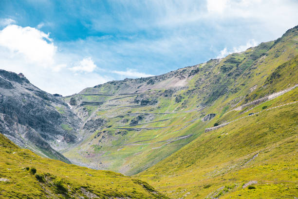 Long winding road at the last part of the Stelvio Pass seen from the top