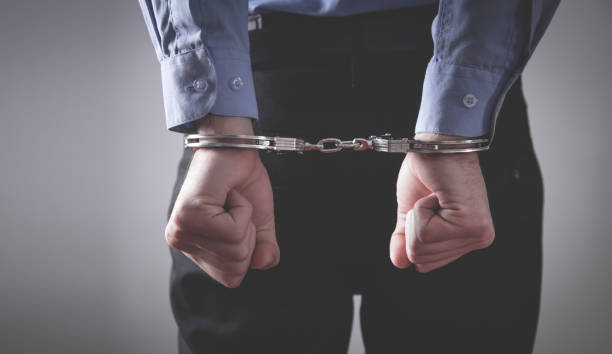 istock Caucasian man hands in handcuffs. Arrest 1264290286