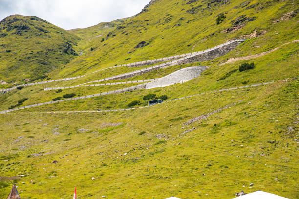 Long winding road at the last part of the Stelvio Pass seen from the top
