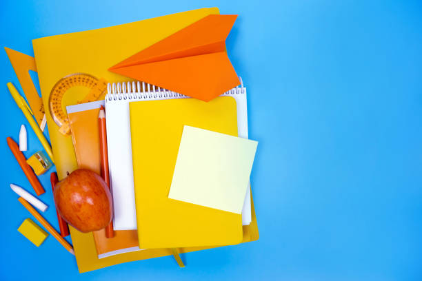 istock School minimal consept top view blue and yellow color. 1264294168