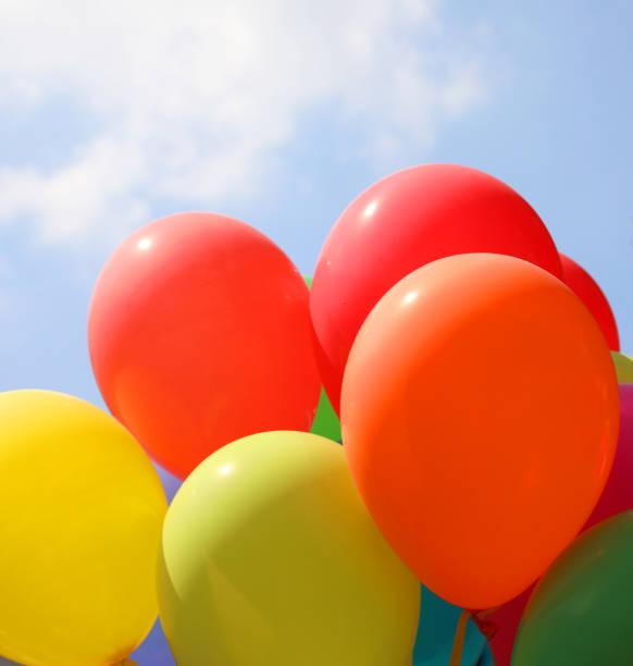 istock party with colorful balloons and blue sky 1264298873