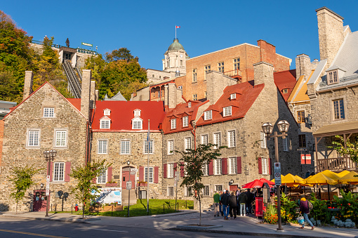 Quebec City, Canada - 4 October 2019: Traditional stone houses on Boulevard Champlain in the Petit Champlain historic district.