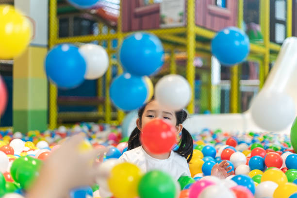 istock Cute girl at the Ball Pool 1264300221