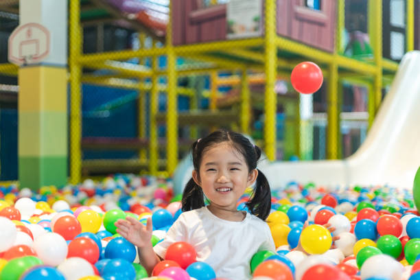 istock Cute girl at the Ball Pool 1264300284