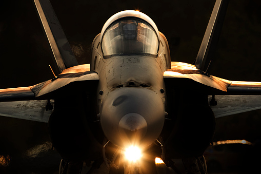 Fighter aircraft during the sunset