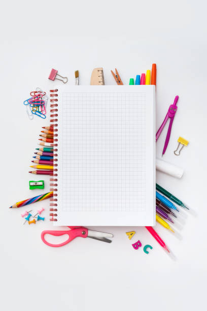 istock Blank squared notebook on colorful school supplies 1264306061