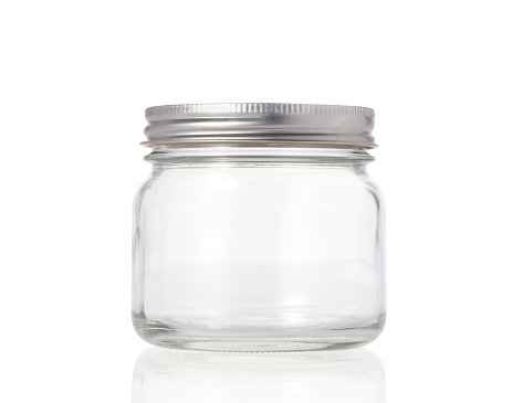 Mayonnaise in glass jar isolated on white