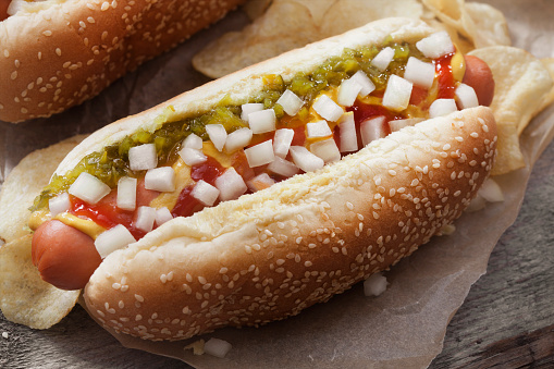 The Classic Ballpark Hotdog with, Ketchup, Mustard, Relish, Onions and Potato Chips